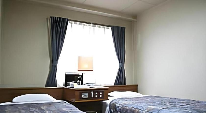 Kochi Business Hotel Bekkan Экстерьер фото